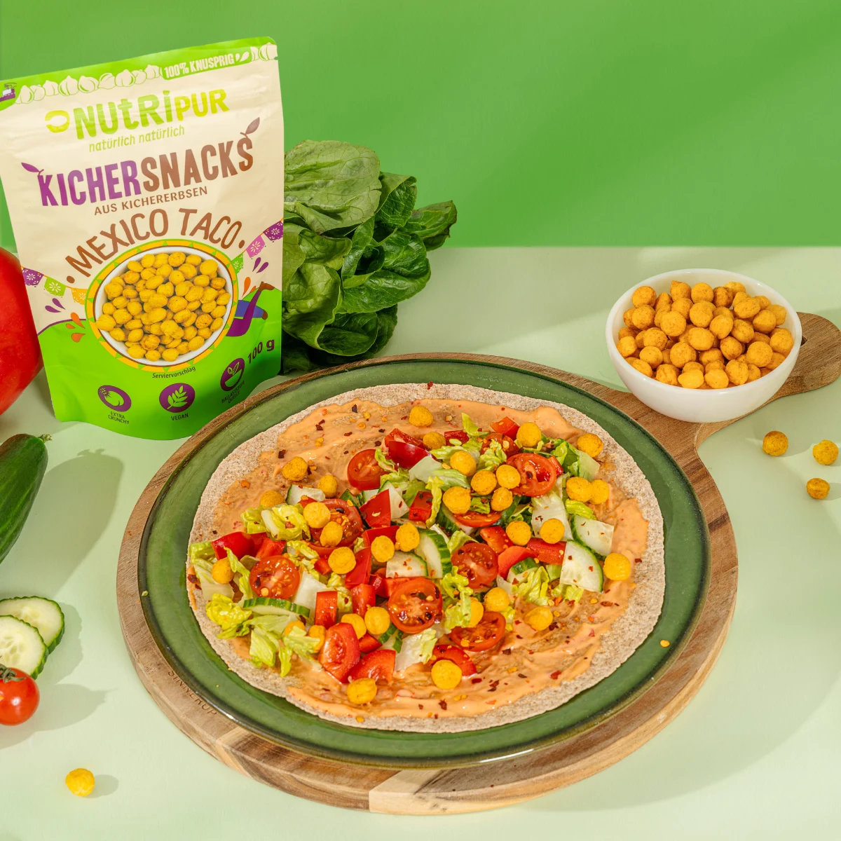 Billedet viser de ristede kikærtesnacks “Mexico Taco” som topping i lækre wraps.