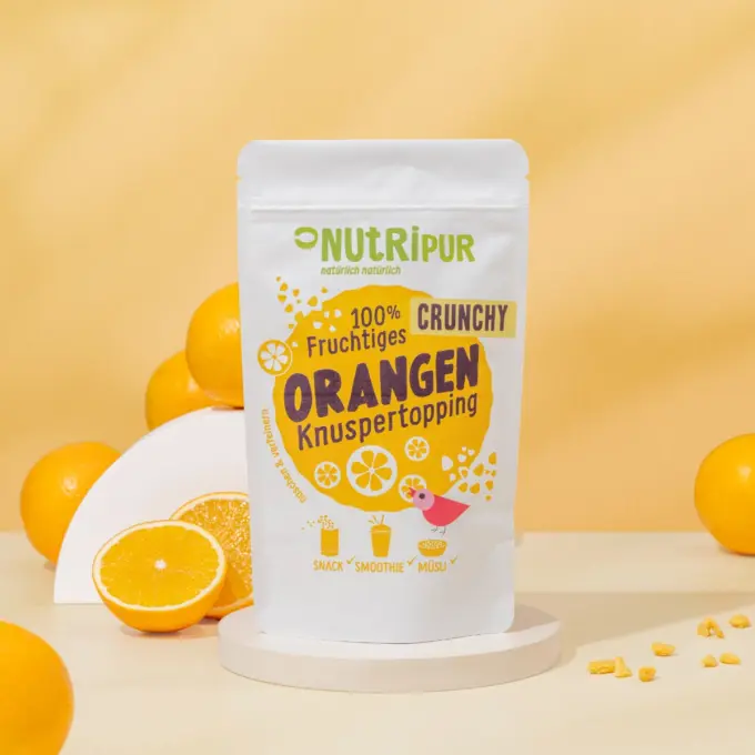 Detaljebillede af emballagen og det crunchy orange topping