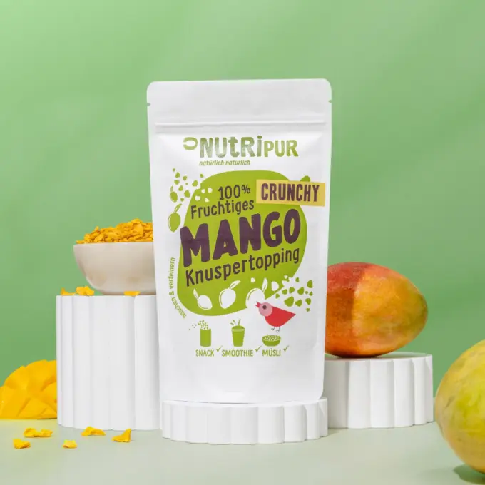 Detaljebillede af emballagen og Crunchy Mango Toppings
