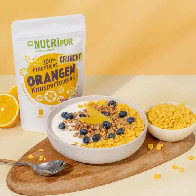 Billedet viser crunchy orange topping i müsli.