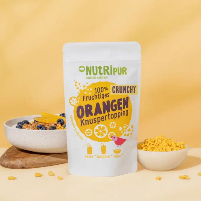 Billedet viser crunchy orange topping i skåle.